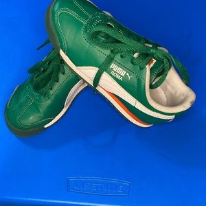 Green “child” puma tennis shoes